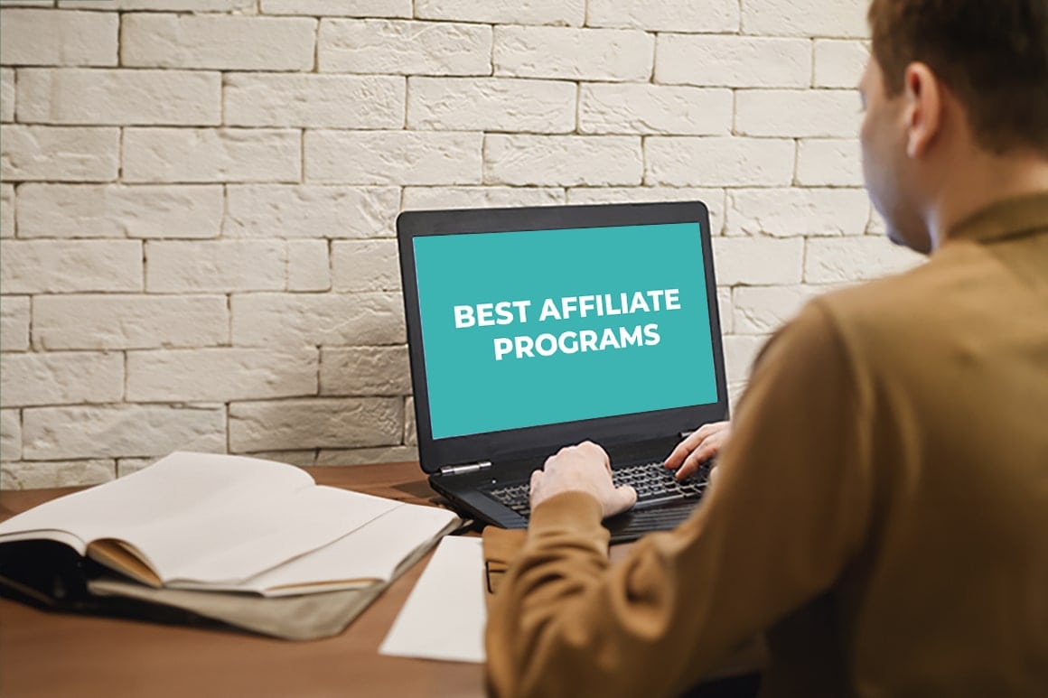 Image-of-a-person-looking-at-a-laptop-with-text-best-affiliate-programs-1160x773-1